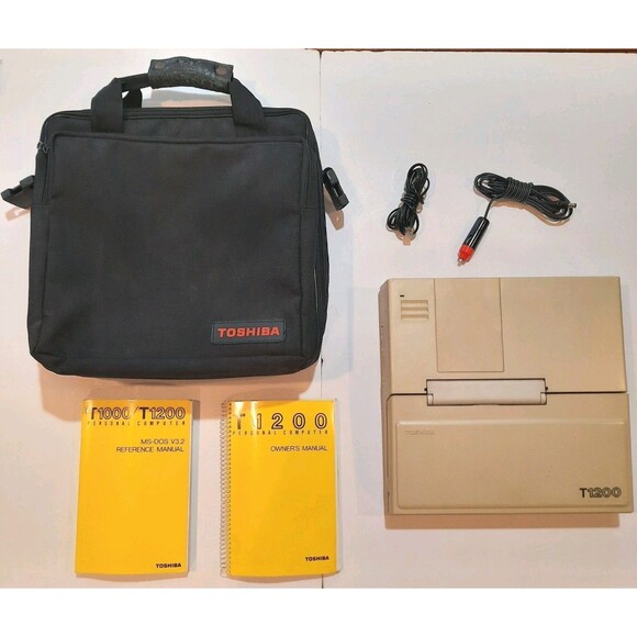 Toshiba T1200  Laptop  Untested Powers On Bag, Manual, Car Adapter Parts Repair - Picture 1 of 4